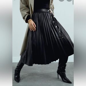 Brand New, unworn ZARA black faux leather pleated A line midi skirt.